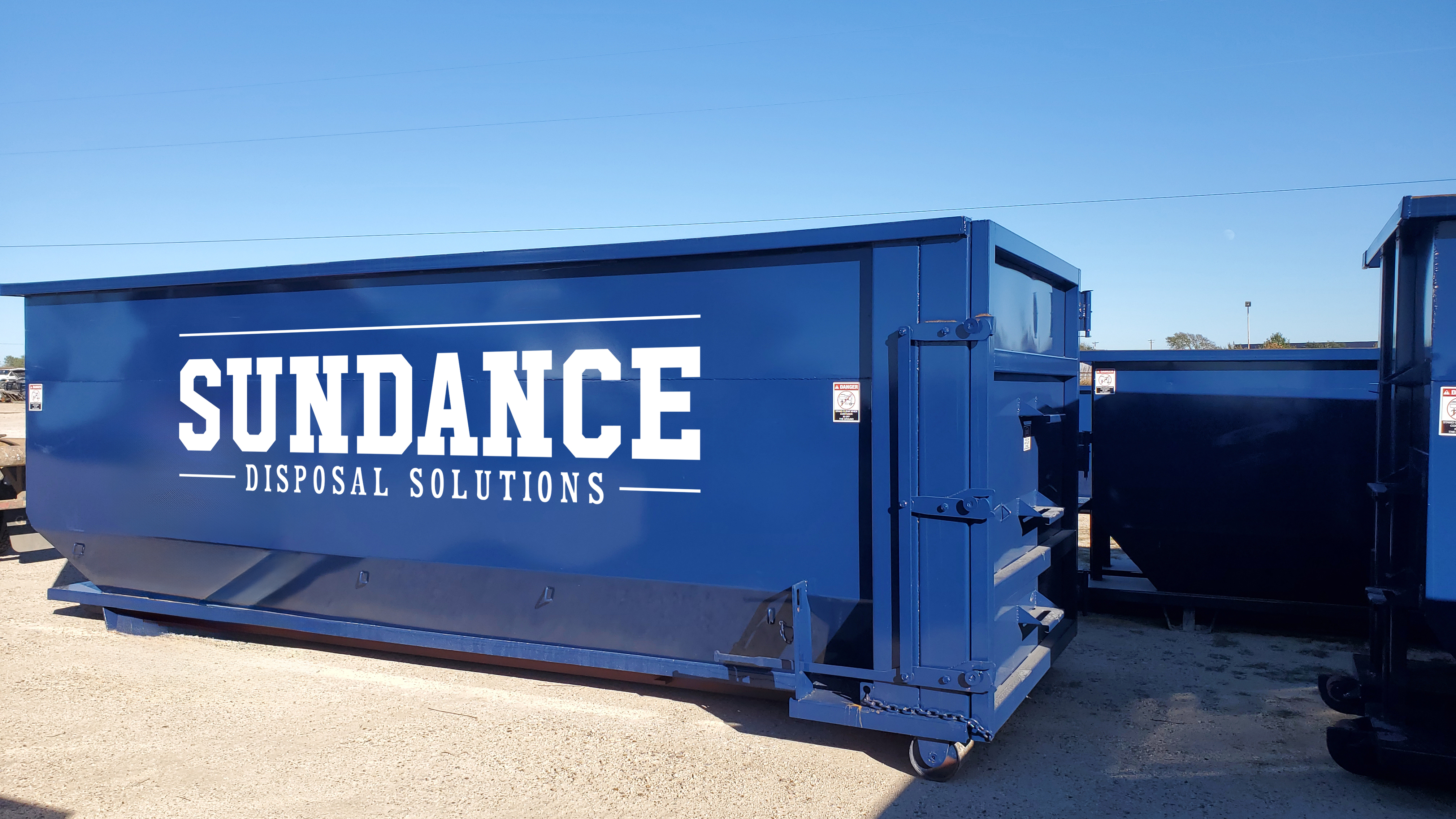 Roll-off dumpster at job site